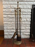 full set on stand in front of fireplace