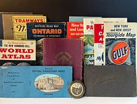 Group shot of all maps, brochures, booklets displayed upright