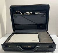 Open Samsonite case showing Toshiba T4500C laptop, foam insert, interior pocket with power cable