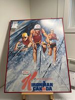 Full view of framed poster showing artwork and cracked glass