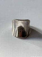 Front view showing wide curved sterling band