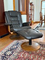 Chair and ottoman full view displaying design and materials