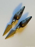 Pair of corn holders angled view