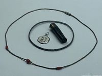 Group view bracelet, necklace, charm, black pendant