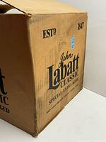 Cardboard box showing brand, product line and ESTD 1847 text
