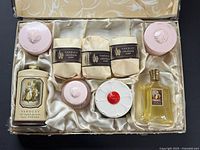 Full view of gift set inside satin-lined box showing all products