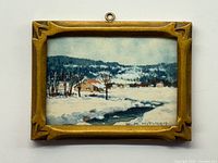 Front view of framed miniature watercolour landscape