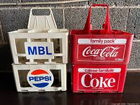 Front view of all three plastic bottle carriers