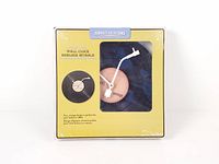 Front of boxed Perfect Solutions vinyl record wall clock