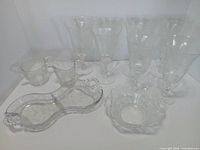 Entire lot showing six goblets, divided relish dish, scalloped bowl, creamer and sugar