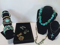 Overall view showing necklaces, bracelets and earrings on displays