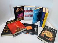 All eight Dean Koontz hardcovers displayed upright and flat