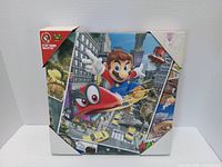 Front of packaged 16" Mario Odyssey canvas showing artwork and license markings