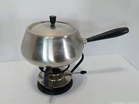 fondue pot assembled on stand