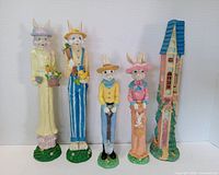 Front view of all five Windsor Easter pencil figurines