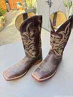 Both boots standing to show overall appearance and shaft embroidery