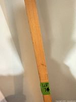 Full view of shaft section showing natural wood and lot sticker