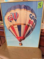 Full view of framed hot air balloon photographic print