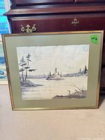 Full view of framed watercolor with mat and gold frame