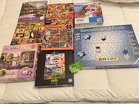 Group shot of all eight boxed puzzles showing covers and brands