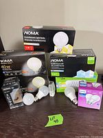 All boxed and loose bulbs arranged on tabletop