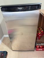 Front view of Danby bar fridge showing stainless exterior