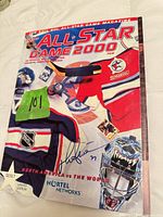 Front cover showing limited edition number 01917 and autograph