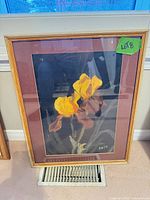 Framed pastel of yellow irises, full view