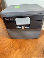 Front view of SentrySafe document box showing latch and key lock