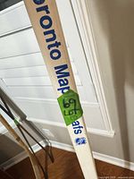 Toronto Maple Leafs decal and NHL logo on stick shaft