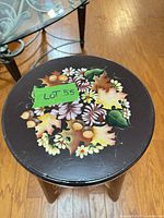 Painted seat detailing autumn floral motif