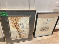 Both framed drawings side by side