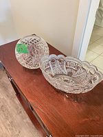 Both crystal bowls on table