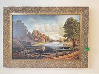 Full view of framed landscape painting