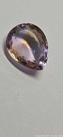 Pear-shaped ametrine showing bicolour zoning