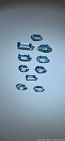 All ten faceted aquamarines arranged in column