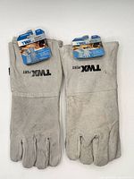 Front view showing two pairs of gloves with tags