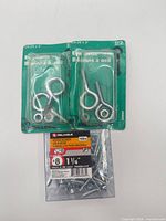 Overall view: two eye bolt packs and wood screw box