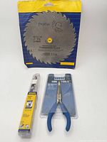 Packaged Procut blade, Irwin auger bit, Rogue plier group shot