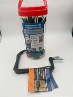 Jar of multi-purpose ties beside utility hanger showing overall lot contents