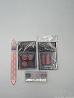 Group shot showing all packaged items and nail file