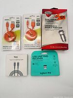 Retail packages of all five electronic accessories