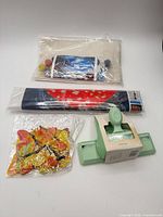 Group shot of all four packaged craft items