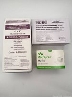 Front view of all three sealed medical supply packs