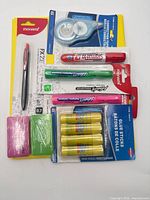 All packaged office supplies laid out