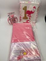 Overview of packaged table covers, banner, and cup