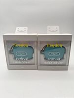front view of two boxed heyday earbud case covers