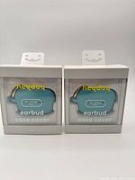 Front view of both boxed heyday earbud case covers