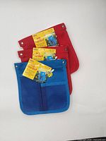 Front view showing three belts stacked, colors visible