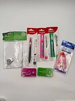 All seven packaged office supply items